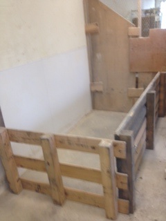 Pallets are used to create the jug, or pen, where the lambs will be born