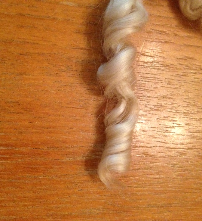 Teeswaters grow tightly curled locks 